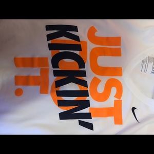 My wife’s Nike workout out shirt.